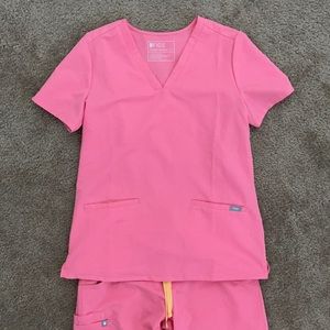 Set of figs scrubs neon pink size small/small